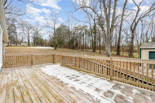 deck featuring an outdoor structure