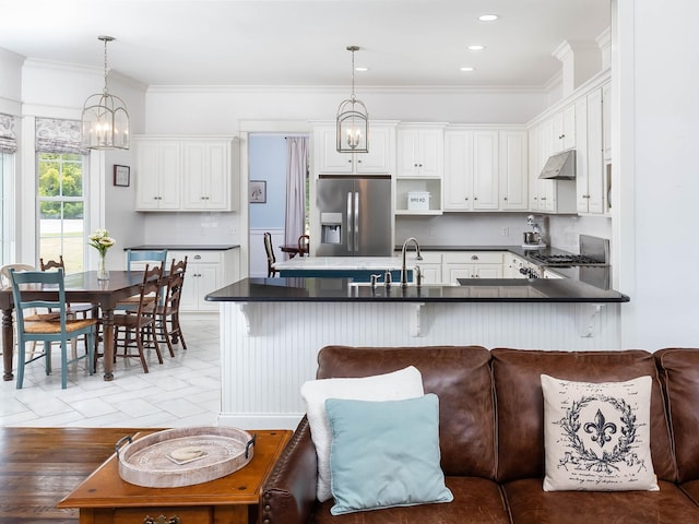 1698 Burke Hollow Rd, Nolensville, TN 37135 - kitchen featuring dark countertops, stainless steel fridge, stove, and under cabinet range hood