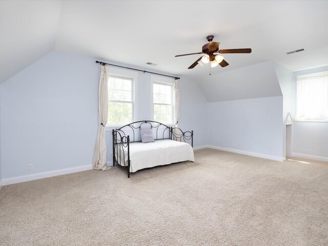 1698 Burke Hollow Rd, Nolensville, TN 37135 - living area with light carpet, visible vents, ceiling fan, and lofted ceiling