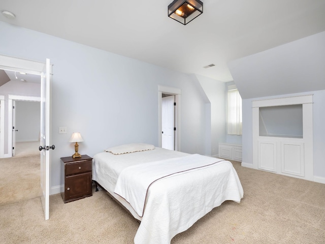 1698 Burke Hollow Rd, Nolensville, TN 37135 - bedroom with visible vents, baseboards, light colored carpet, and lofted ceiling