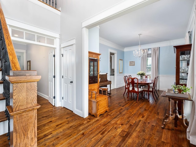1698 Burke Hollow Rd, Nolensville, TN 37135 - foyer entrance with ornamental molding, a chandelier, wood finished floors, and stairs