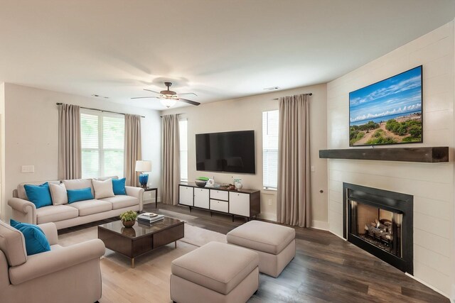 224 Griffin Ln, Gallatin, TN 37066 - living area featuring visible vents, a ceiling fan, wood finished floors, and a fireplace