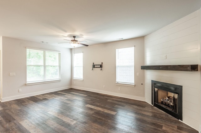 224 Griffin Ln, Gallatin, TN 37066 - unfurnished living room with a fireplace, dark wood-style flooring, baseboards, and a ceiling fan