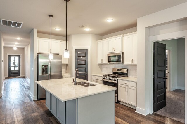 224 Griffin Ln, Gallatin, TN 37066 - kitchen with visible vents, baseboards, a sink, and appliances with stainless steel finishes