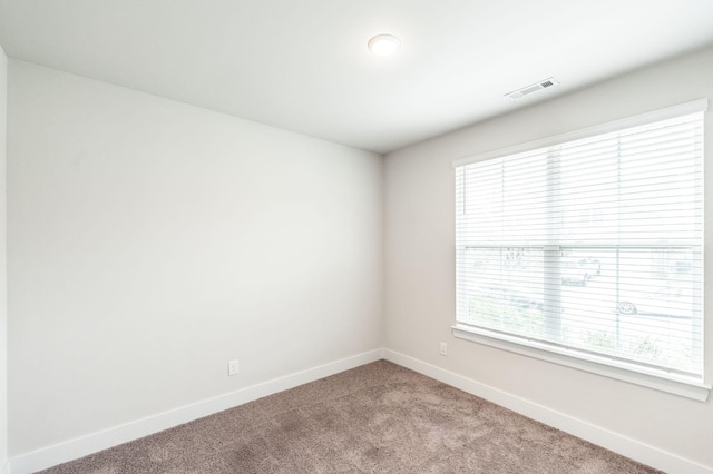 224 Griffin Ln, Gallatin, TN 37066 - unfurnished room featuring light carpet, baseboards, and visible vents
