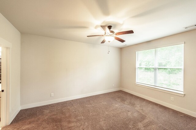 224 Griffin Ln, Gallatin, TN 37066 - spare room featuring ceiling fan, carpet flooring, baseboards, and visible vents