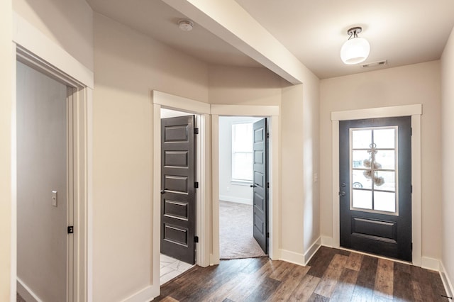 224 Griffin Ln, Gallatin, TN 37066 - foyer entrance with dark wood-style flooring, visible vents, and baseboards