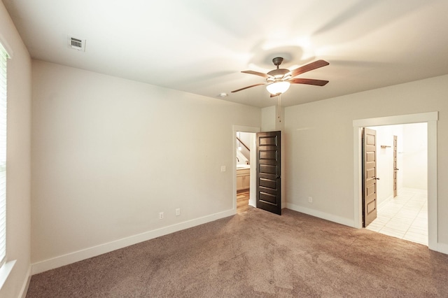 224 Griffin Ln, Gallatin, TN 37066 - unfurnished bedroom with visible vents, light colored carpet, baseboards, and ensuite bathroom