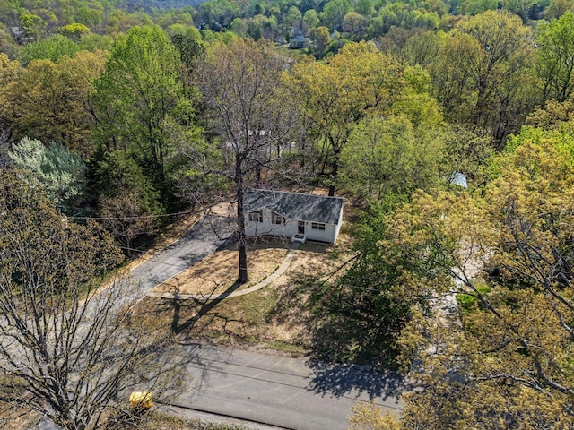 aerial view with a wooded view