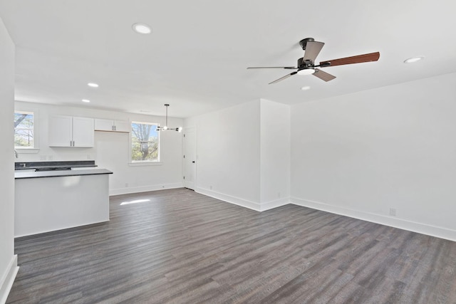 unfurnished living room featuring baseboards, recessed lighting, and ceiling fan