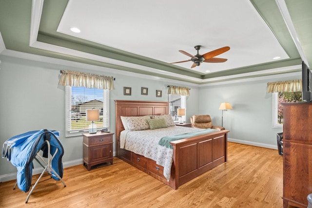 113 St Charles Way, Gallatin, TN 37066 - bedroom featuring a tray ceiling, baseboards, ornamental molding, light wood-type flooring, and recessed lighting