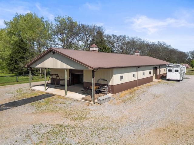 113 St Charles Way, Gallatin, TN 37066 - view of side of property featuring metal roof and an outbuilding