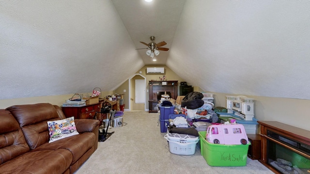interior space with carpet floors, a textured ceiling, and lofted ceiling