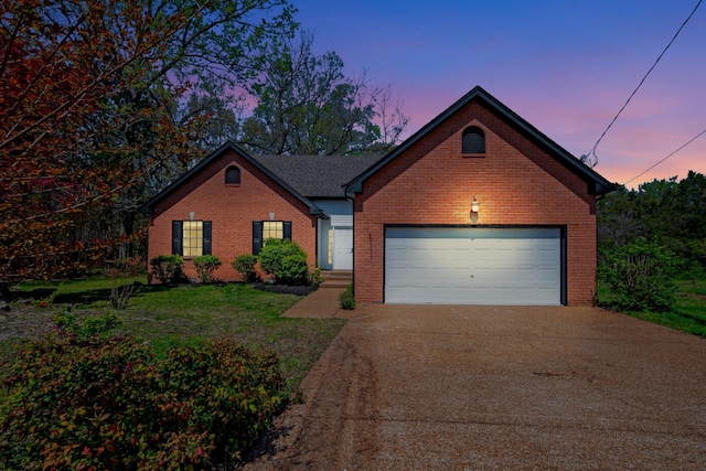 308 Wareham Ct, Antioch, TN 37013 - view of front of property with brick siding, a yard, and driveway