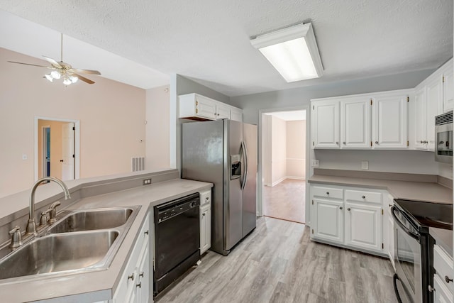 308 Wareham Ct, Antioch, TN 37013 - kitchen with light wood-style flooring, stainless steel refrigerator with ice dispenser, range with electric stovetop, dishwasher, and a sink