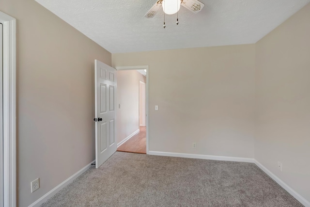 308 Wareham Ct, Antioch, TN 37013 - carpeted empty room with a textured ceiling, ceiling fan, and baseboards