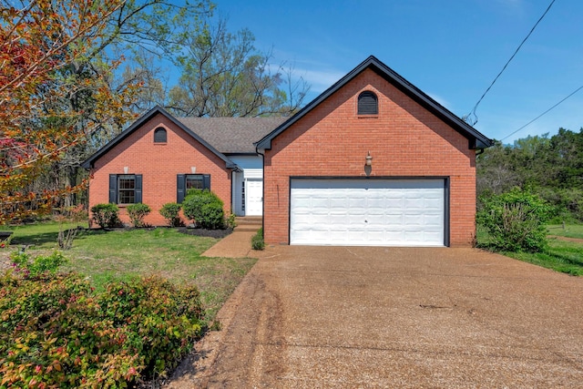 308 Wareham Ct, Antioch, TN 37013 - view of front facade featuring concrete driveway, a front yard, brick siding, and an attached garage