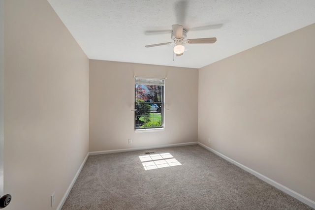 308 Wareham Ct, Antioch, TN 37013 - unfurnished room with carpet floors, baseboards, a ceiling fan, and a textured ceiling