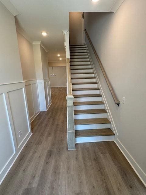 5818 Willoughby Way, Murfreesboro, TN 37129 - staircase featuring wood finished floors, ornamental molding, wainscoting, recessed lighting, and a decorative wall