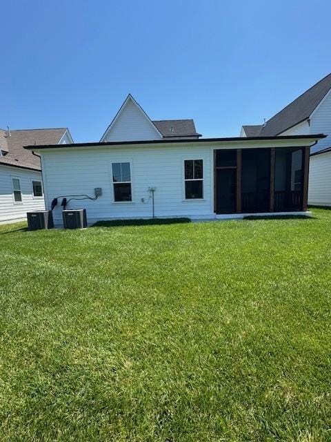 5818 Willoughby Way, Murfreesboro, TN 37129 - back of house featuring a sunroom and a lawn