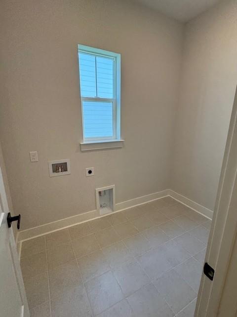 5818 Willoughby Way, Murfreesboro, TN 37129 - washroom with hookup for an electric dryer, hookup for a washing machine, and tile patterned floors