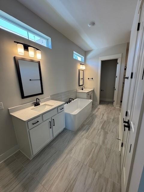 5818 Willoughby Way, Murfreesboro, TN 37129 - bathroom featuring a freestanding tub and two vanities
