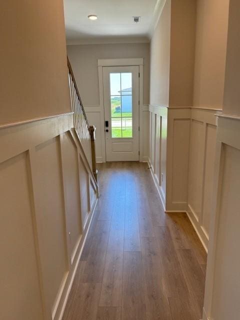 5818 Willoughby Way, Murfreesboro, TN 37129 - entryway with a decorative wall, wood finished floors, crown molding, stairway, and wainscoting