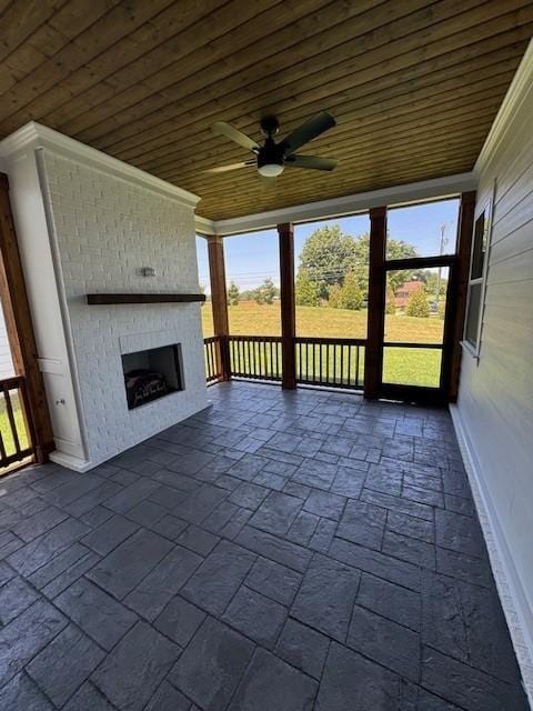 5818 Willoughby Way, Murfreesboro, TN 37129 - unfurnished sunroom with an outdoor brick fireplace, ceiling fan, and plenty of natural light