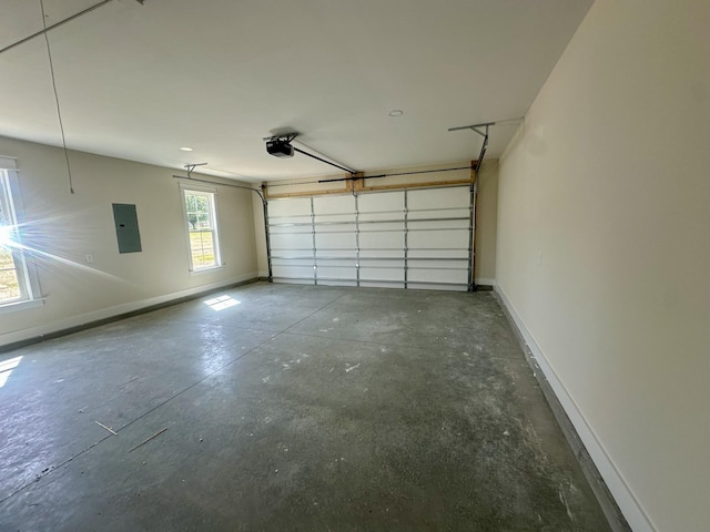 2240 Eugene Reed Rd, Woodbury, TN 37190 - garage with electric panel, baseboards, and a garage door opener