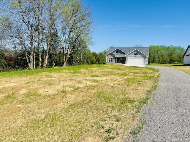 2240 Eugene Reed Rd, Woodbury, TN 37190 - exterior space featuring driveway and a garage