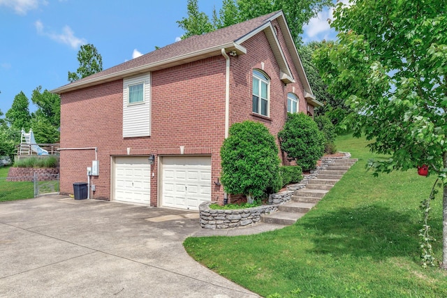 1528 Anthony Way, Mount Juliet, TN 37122 - view of home's exterior featuring concrete driveway, an attached garage, brick siding, and roof with shingles