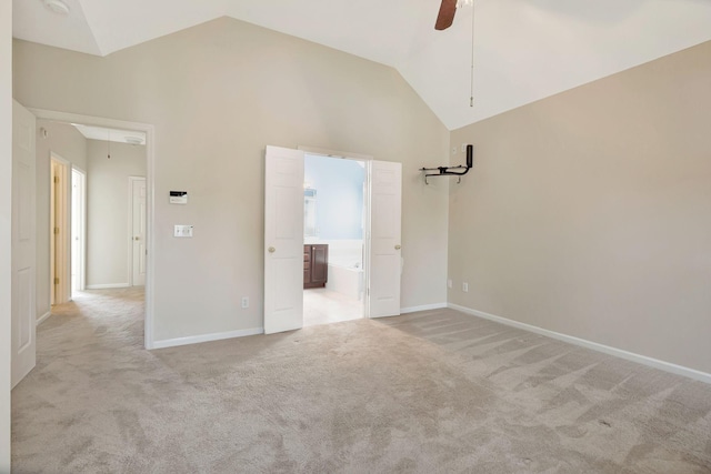 1528 Anthony Way, Mount Juliet, TN 37122 - unfurnished bedroom with attic access, vaulted ceiling, light carpet, baseboards, and connected bathroom
