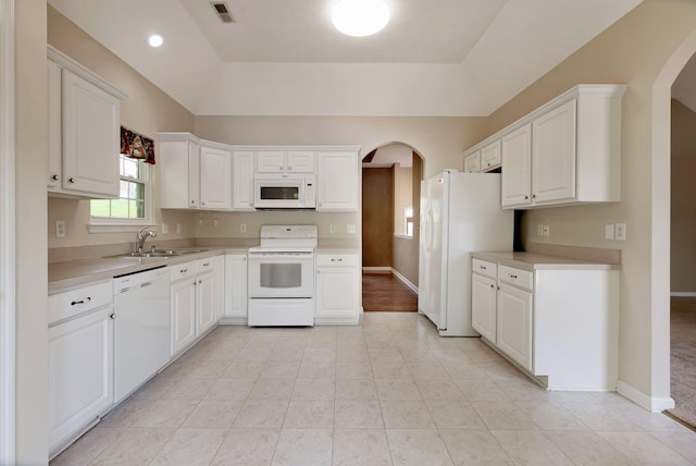 1528 Anthony Way, Mount Juliet, TN 37122 - kitchen featuring white appliances, arched walkways, a sink, and light countertops