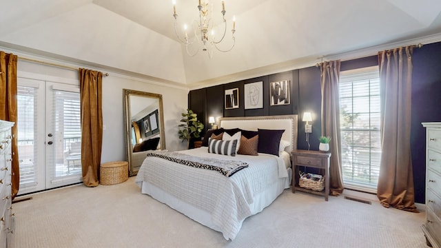 bedroom featuring light carpet, access to exterior, an inviting chandelier, and multiple windows