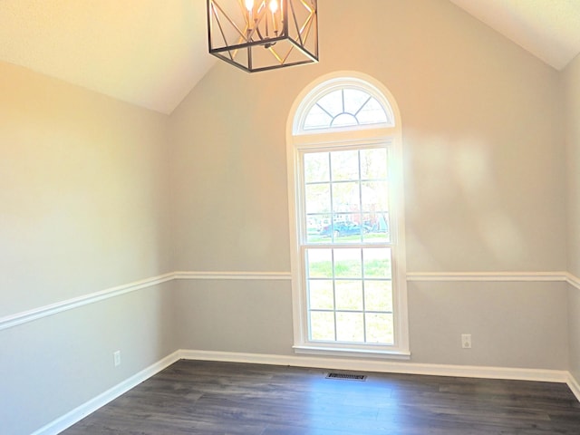436 Bluff Dr, Clarksville, TN 37043 - unfurnished room featuring visible vents, baseboards, a chandelier, dark wood-style floors, and lofted ceiling