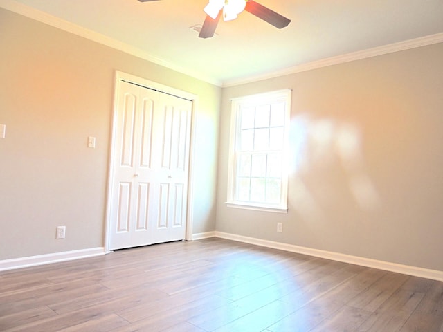 436 Bluff Dr, Clarksville, TN 37043 - unfurnished bedroom featuring baseboards, a closet, and ornamental molding
