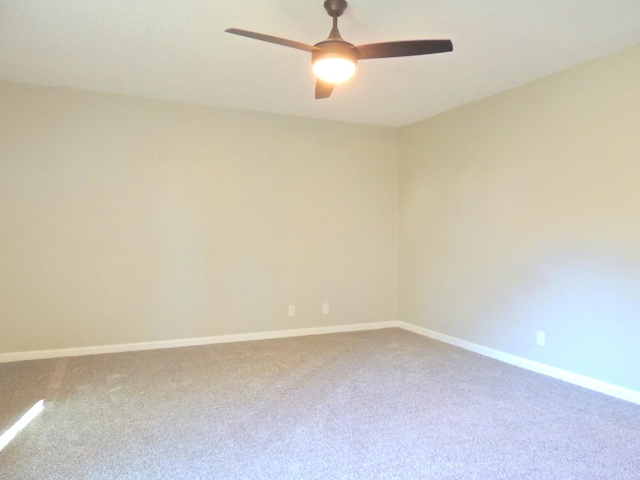 436 Bluff Dr, Clarksville, TN 37043 - carpeted spare room featuring baseboards and a ceiling fan
