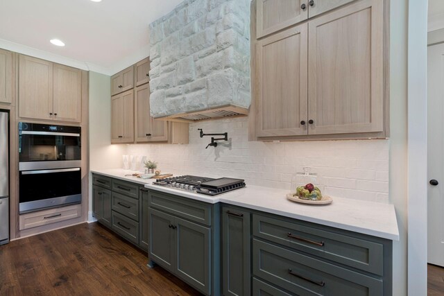 3050 Horn Springs Rd, Lebanon, TN 37087 - kitchen with appliances with stainless steel finishes, dark wood-style floors, gray cabinetry, custom range hood, and backsplash