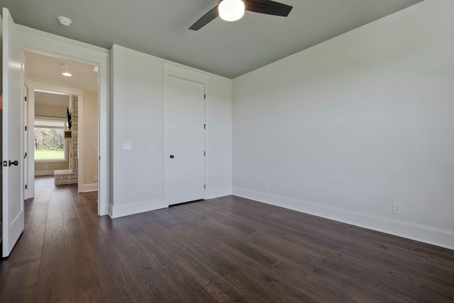 3050 Horn Springs Rd, Lebanon, TN 37087 - unfurnished bedroom with a closet, baseboards, ceiling fan, and dark wood-style floors