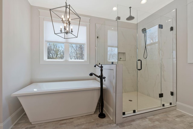 3050 Horn Springs Rd, Lebanon, TN 37087 - full bathroom with a wealth of natural light, baseboards, a chandelier, and a soaking tub