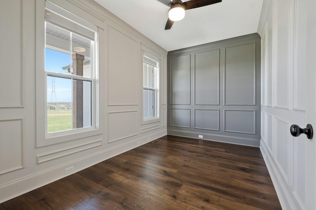 3050 Horn Springs Rd, Lebanon, TN 37087 - empty room featuring dark wood-type flooring, a decorative wall, and ceiling fan
