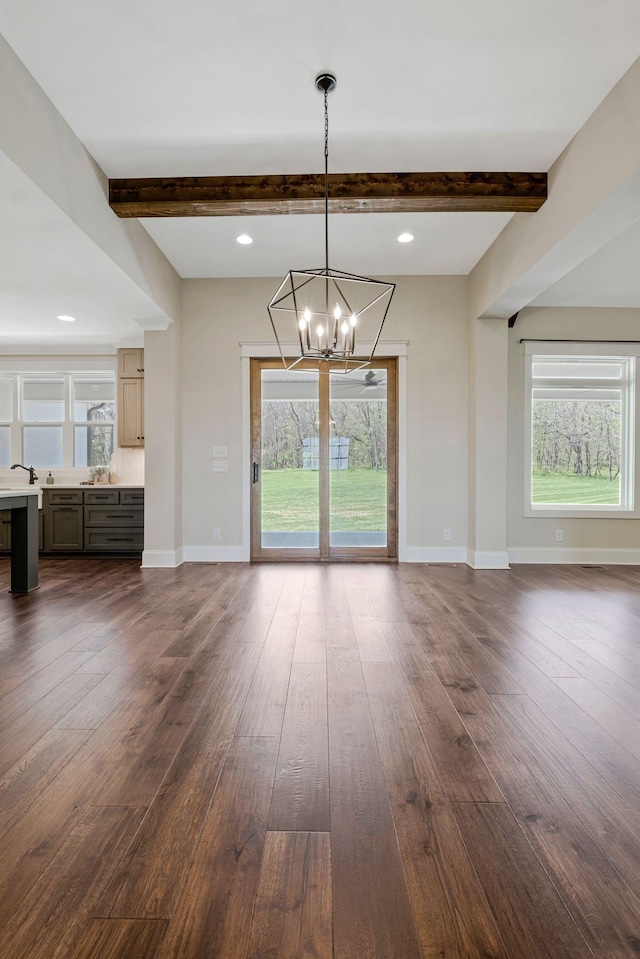 3050 Horn Springs Rd, Lebanon, TN 37087 - unfurnished dining area featuring dark wood-style flooring, beam ceiling, and a healthy amount of sunlight