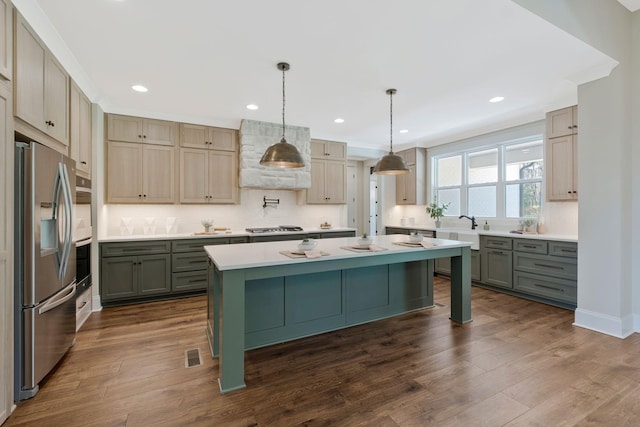 3050 Horn Springs Rd, Lebanon, TN 37087 - kitchen with tasteful backsplash, light countertops, dark wood-type flooring, and stainless steel appliances