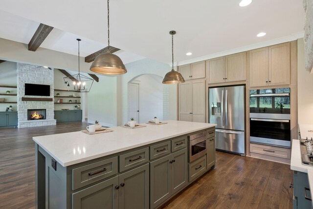3050 Horn Springs Rd, Lebanon, TN 37087 - kitchen featuring dark wood-style floors, open floor plan, gray cabinets, and appliances with stainless steel finishes
