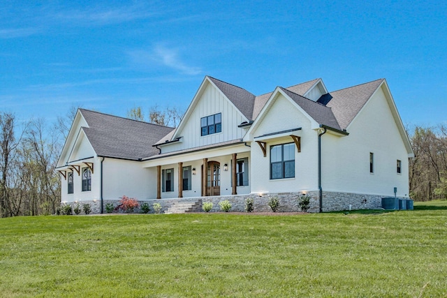 3050 Horn Springs Rd, Lebanon, TN 37087 - modern farmhouse style home featuring a porch, board and batten siding, central air condition unit, and a front lawn