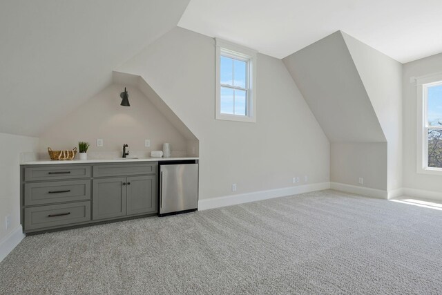3050 Horn Springs Rd, Lebanon, TN 37087 - additional living space featuring light carpet, baseboards, a sink, and lofted ceiling