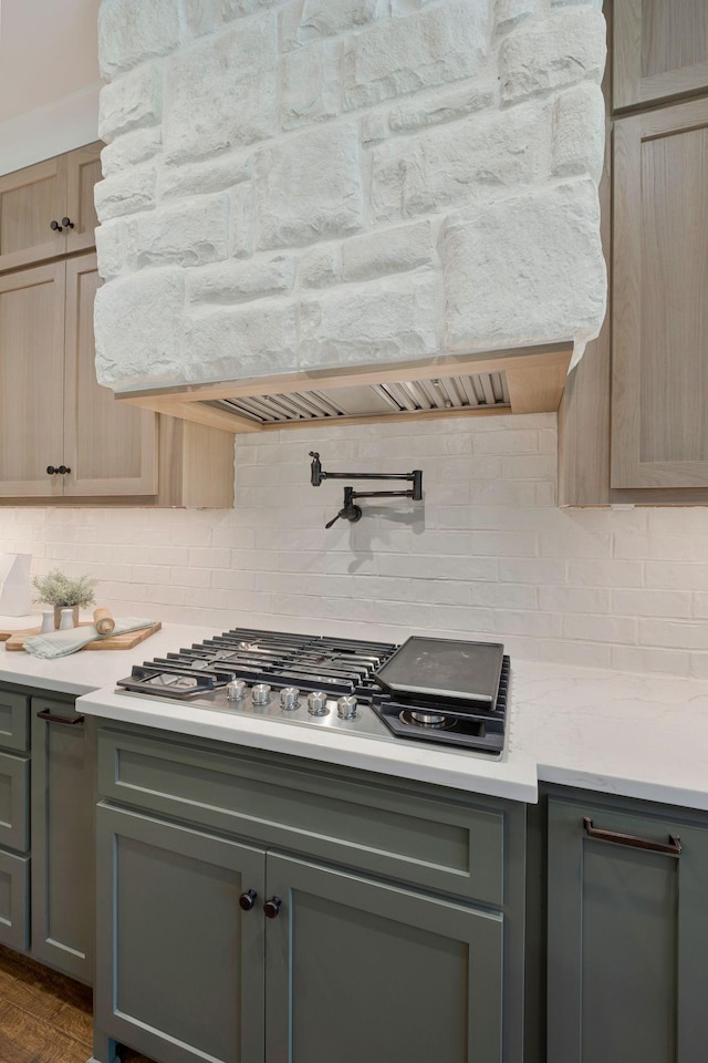 3050 Horn Springs Rd, Lebanon, TN 37087 - kitchen with stainless steel gas stovetop, light countertops, decorative backsplash, and gray cabinets