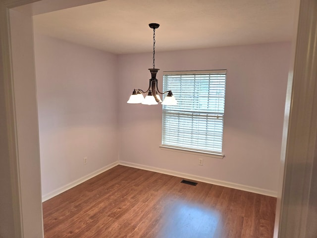307 Parrish Cres, Mount Juliet, TN 37122 - unfurnished room with dark wood-type flooring and a chandelier