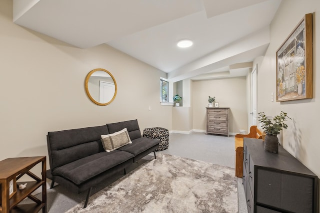 living room featuring baseboards and carpet flooring
