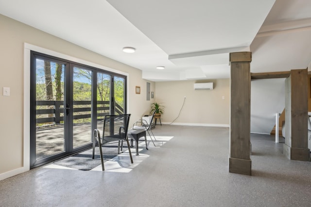 interior space featuring french doors, baseboards, stairway, and a wall mounted air conditioner